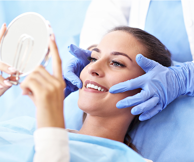 Dentist showing patient the treatment plan.